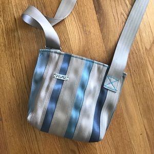 Artisan seatbelt travel purse